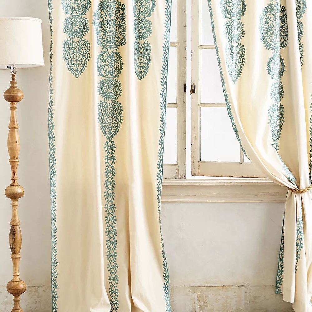 3 Anthropologie curtains 42x84”.